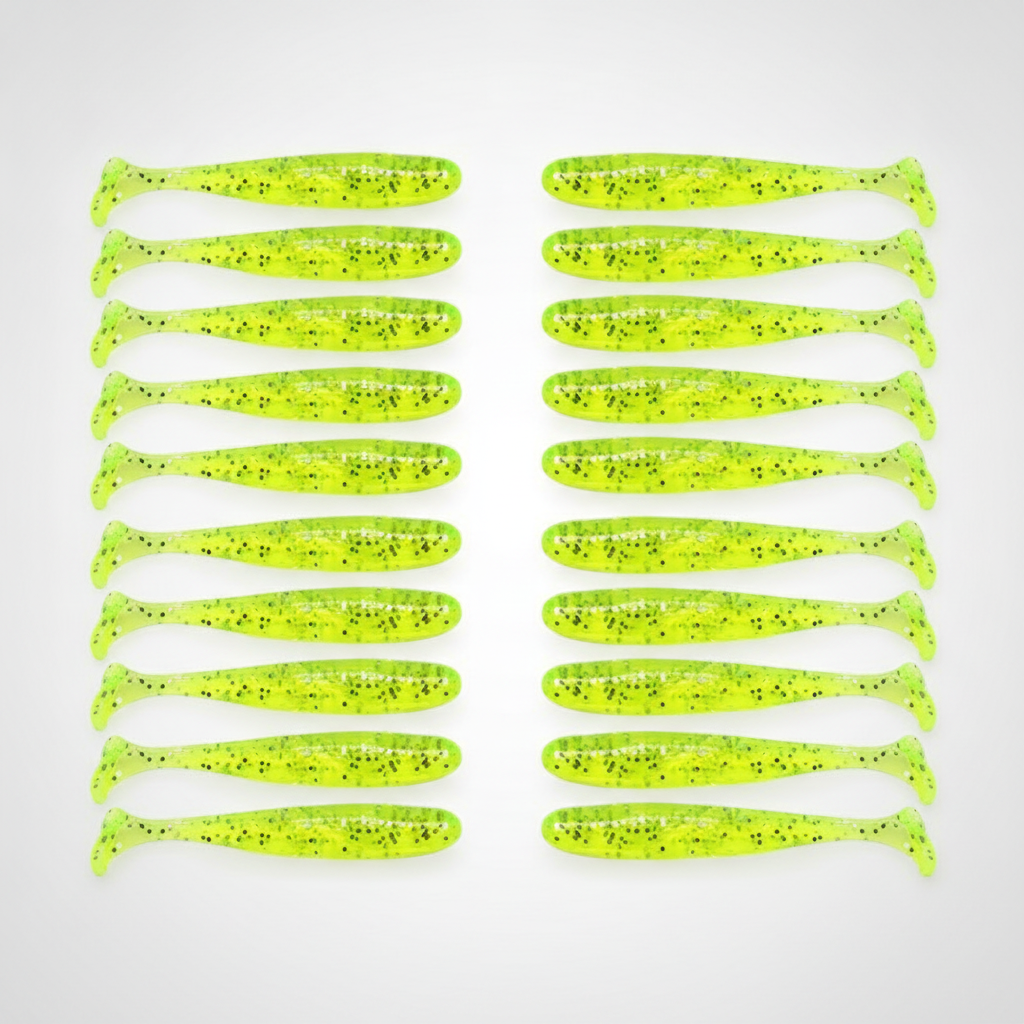 Leurre souple à queue en T coloris vert fluo pailleté, packshot studio sur fond blanc, lot de 20.