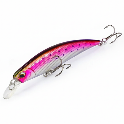 Poisson nageur coloris rose violet, packshot studio sur fond blanc.