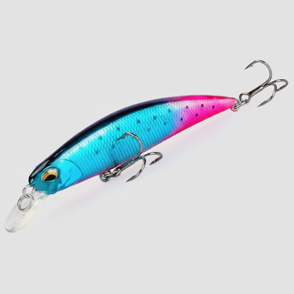 Poisson nageur coloris bleu marine rose, packshot studio sur fond blanc.