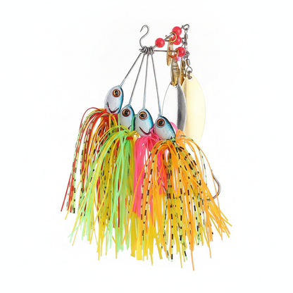 Les 4 spinnerbaits du lot alignés, palettes dorées groupées, jupe silicone dans les 4 coloris du lot, vue studio