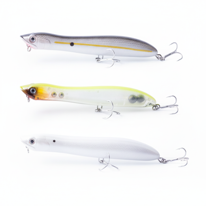 Boîte de 3 pencil poppers coloris doré tigré, bleu transparent et jaune transparent, vue studio sur fond blanc